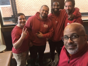 owner chris johnson with some of his fish employees