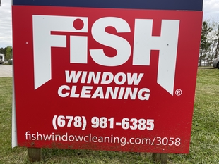 fish window cleaning sign