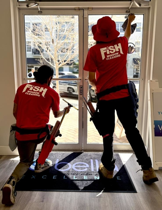 two fish window cleaners inside business cleaning
