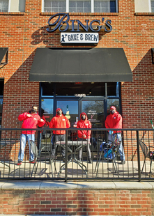 Four Fish Window Cleaning Employees in Front of Bing's Bake and Brew