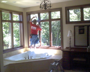 Residential Window Cleaning With A Squeegee