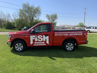 red fish window cleaning truck