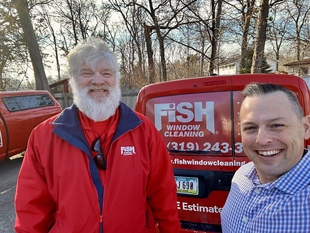 owner curt mccallum taking selfie with a man