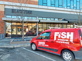 Fish Window Cleaning Van In Front Of Blackfinn Grill