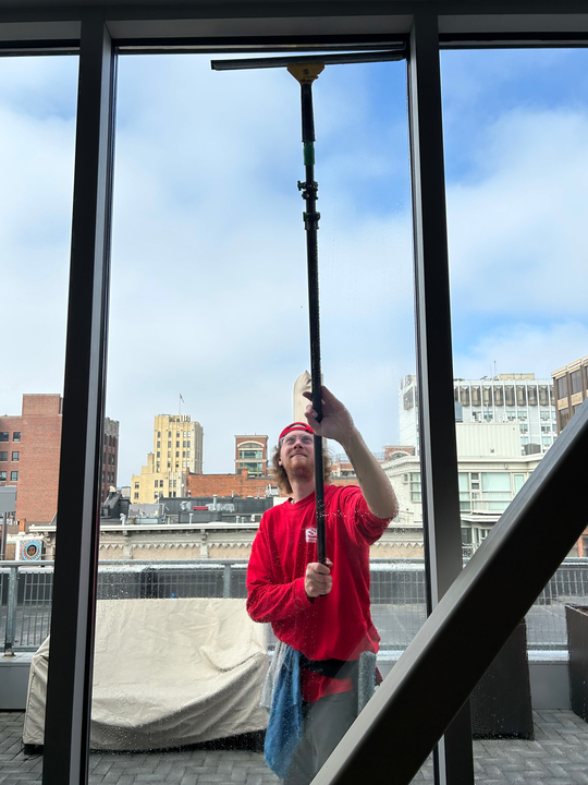 fish window cleaner washing commercial glass outside