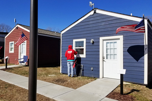 Fish Window Cleaners Cleaning Homes at the Veterans Community Project