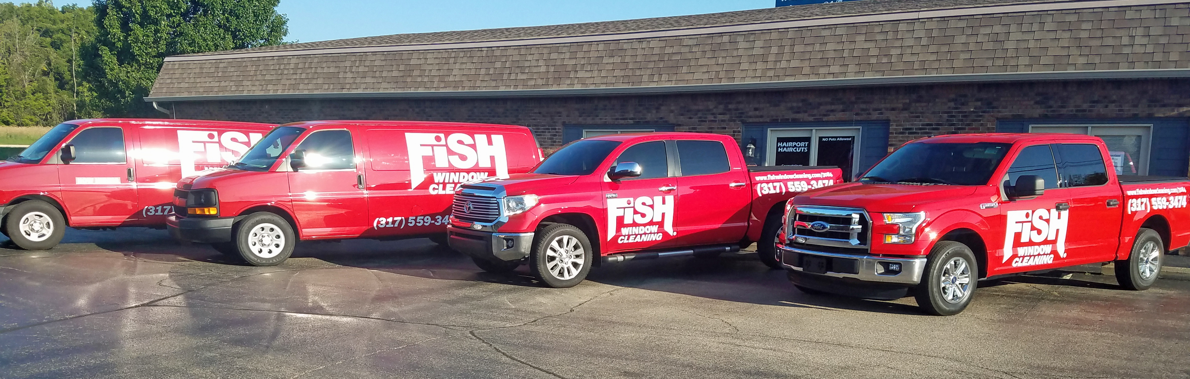 Two Fish Window Cleaning Branded Van and Two Fish Window Cleaning Branded Pickup Trucks