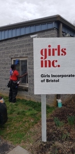 Image of Window Cleaner Cleaning Windows at Girls Incorporated of Bristol