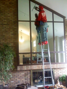 Mirror Cleaning on a Ladder
