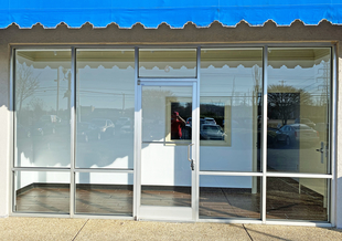 Memphis TN Storefront with 5 Windows, a Glass Door, and Blue Awning