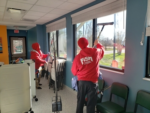 Two Fish Window Cleaners Cleaning Interior Windows of Heritage Humane Society