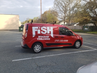 red fish window cleaning van