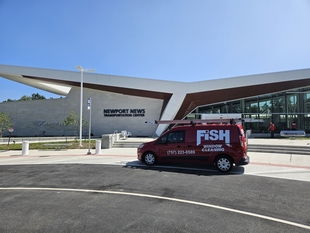 fish window cleaning van in front of new amtrak station