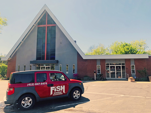 Fish Window Cleaning Branded Vehicle Outside Local Church