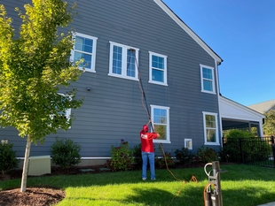 FISH Window Cleaner Using Water-Fed Pole to Clean 2nd Story Window