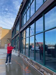 Fish Window Cleaner Using Pole To Clean Cabela's Windows