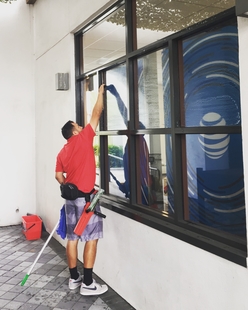 FISH Window Cleaner Cleans Window of AT&T Store