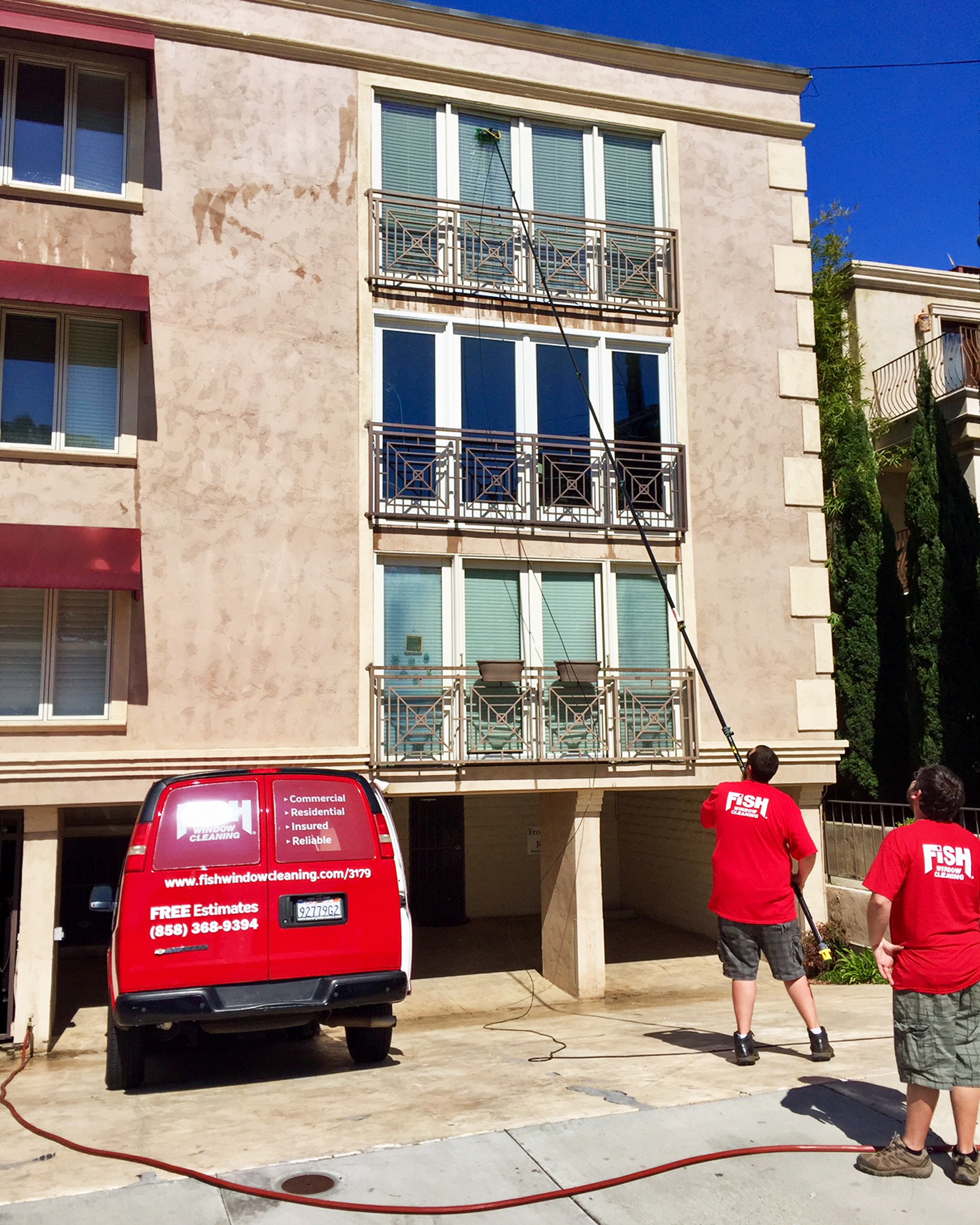 FISH Window Cleaner Cleaning 3rd Story Balcony Windows with a Pole