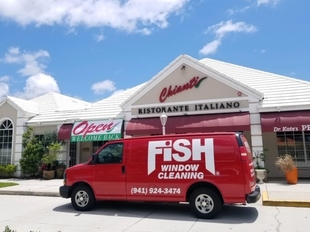 Fish Window Cleaning Branded Van In Front Of Chianti Ristorante Italiano