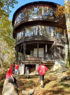 Image of Window Cleaner Cleaning 3-Story Home Windows