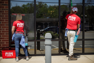 Image of Two Fish Window Cleaners Cleaning Storefront Windows