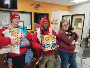 Two Fish Window Cleaners with Donations and Heritage Humane Society Employee