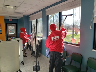 Two Fish Window Cleaners Cleaning Interior Windows of Heritage Humane Society