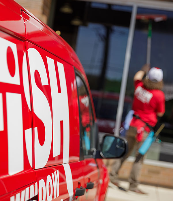 red fish window cleaning van