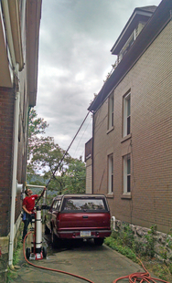 Utilizing A Water-Fed Pole For Hard-To-Reach Windows