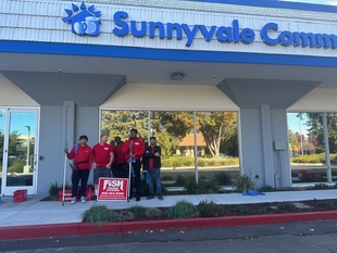 four window cleaning employees standing in front of Sunnyvale Community Services